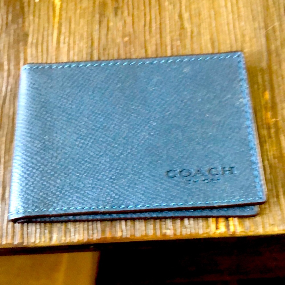 Brand New Coach Navy card holder.  4x2.5